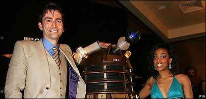 (L-R) David Tennant, Dalek, Freema Agyeman